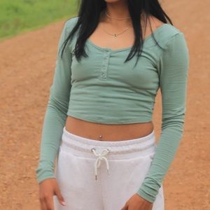 long sleeve crop top with silver buttons